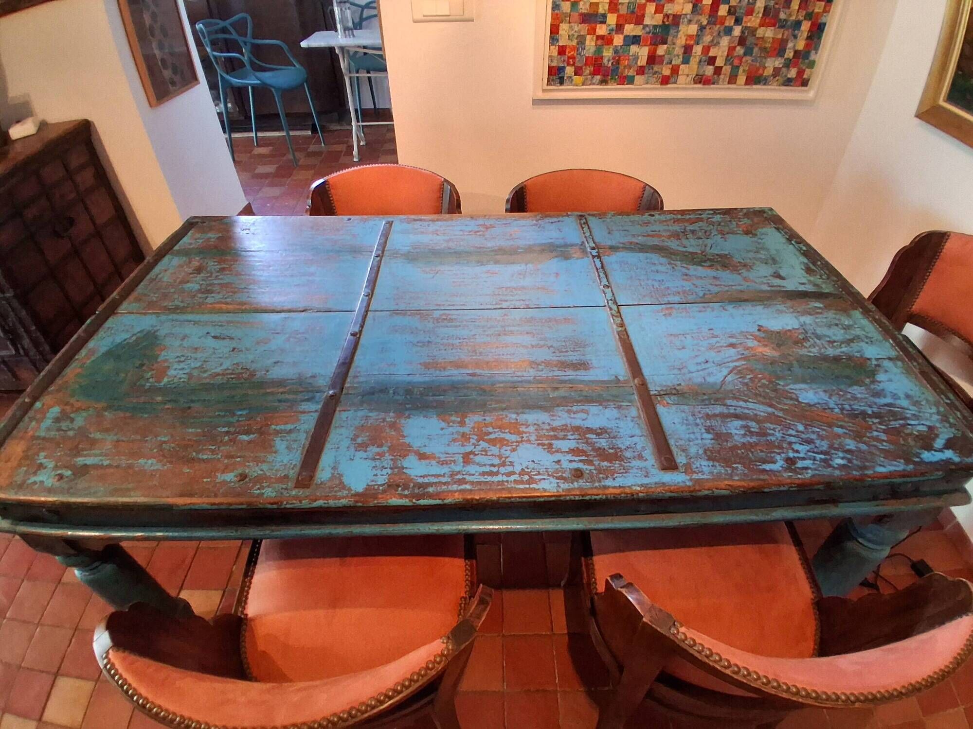 Large antique Indian dining table made of teak wood with patina.