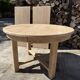 Round solid oak table with extensions, maximum 220cm.