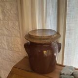 Ancient ceramic salt cellar and its lid.
