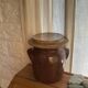 Ancient ceramic salt cellar and its lid.
