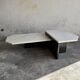 Unique postmodern coffee table in marble and granite.