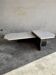 Unique postmodern coffee table in marble and granite.