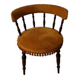 Ochre velvet and pompom bedroom chair