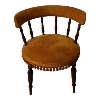 Bedroom chair in ocher velvet and pompoms
