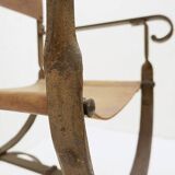 Curule armchair in wrought iron and leather