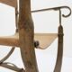Fauteuil curule en fer forgé et cuir