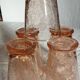 5 pink cracked glasses