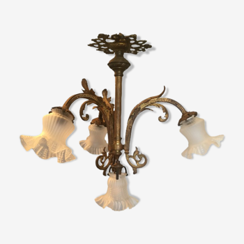Old brass chandelier with tulips