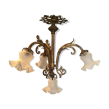 Old brass chandelier with tulips