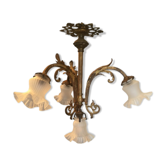 Old brass chandelier with tulips