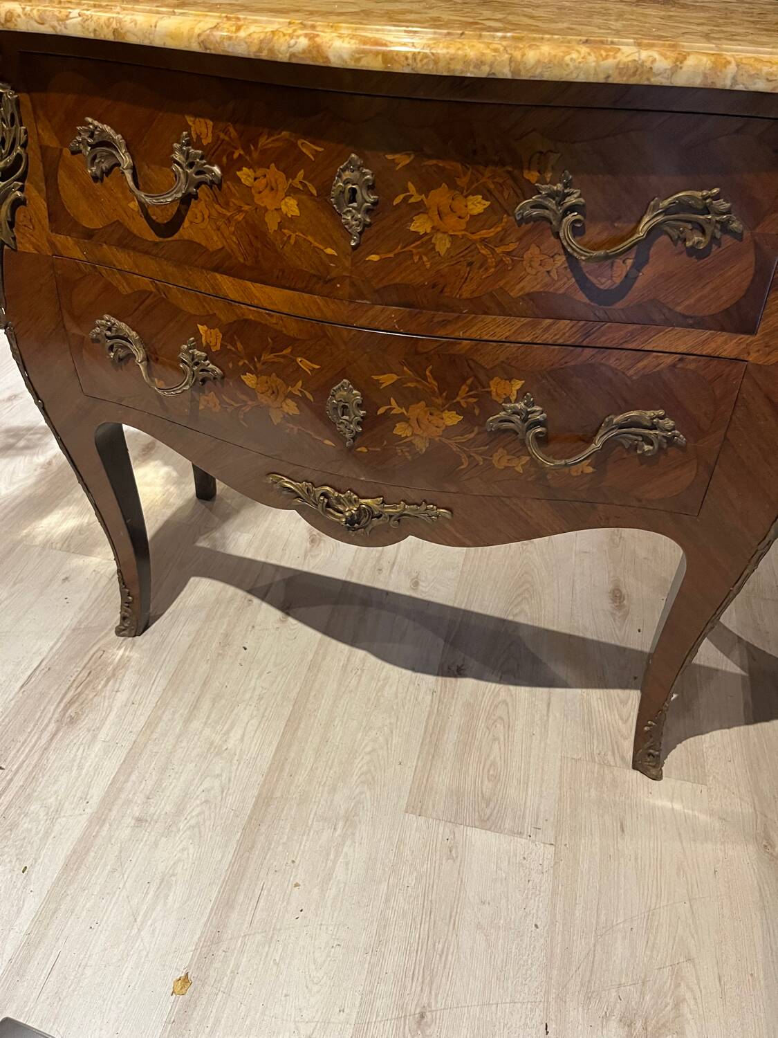 Curved chest of drawers with marquetry and marble