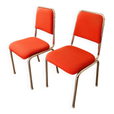 Pair of retro chrome frame chairs with red upholstery