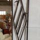 Exceptional and imposing hall wardrobe in hammered wrought iron.