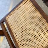 Antique folding chair with weaved seat/back