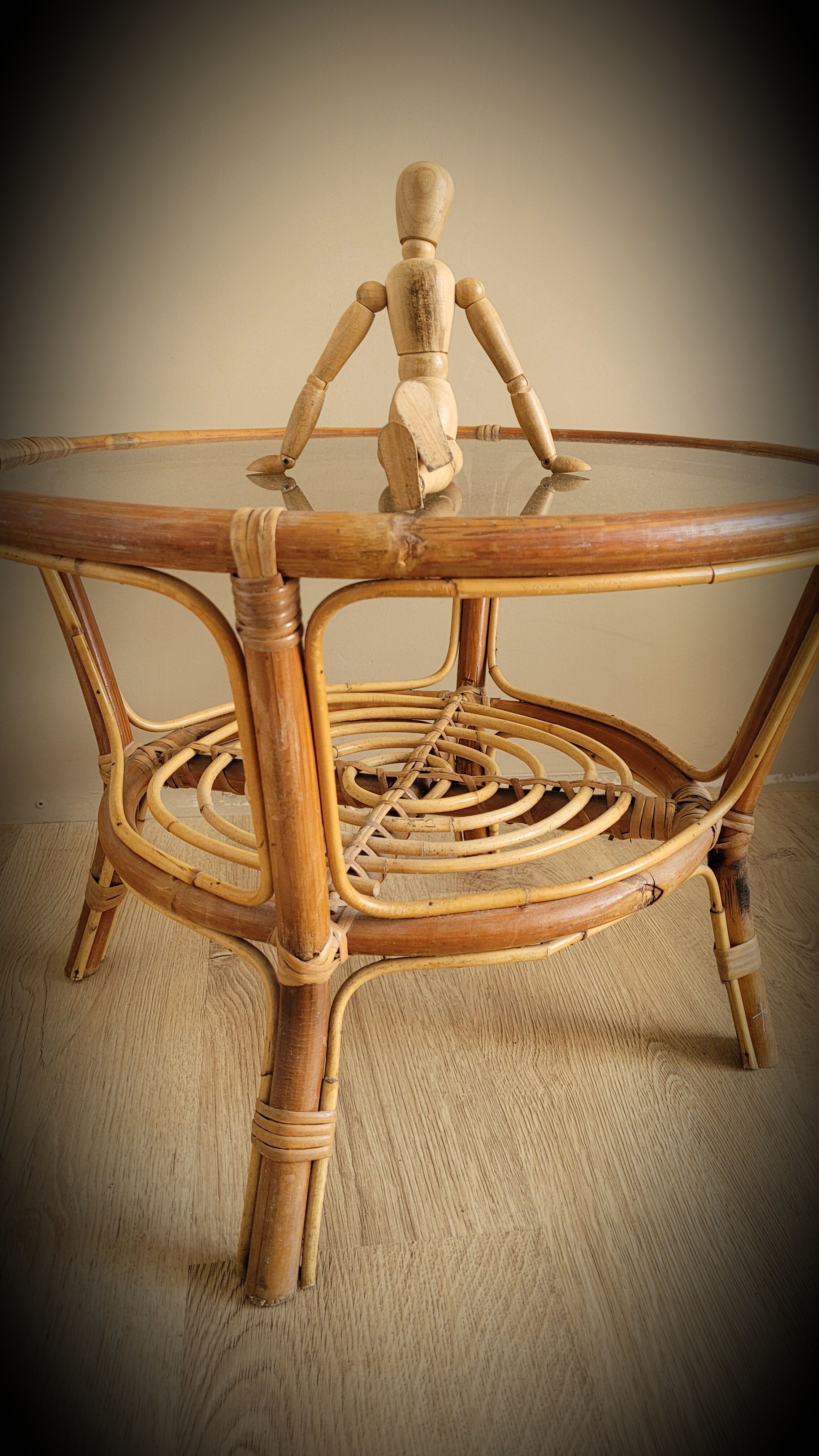 Light rattan lounge table and smoked glass