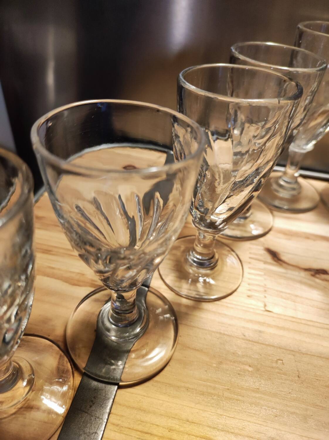 12 small twisted bistro glasses, 19th century