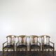 Serie de 4 fauteuils de style directoire à dossier en palmette