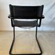 Set of 12 vintage black leather and tubular steel chairs – Italy, year