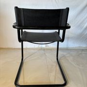 Set of 12 vintage black leather and tubular steel chairs – Italy, year