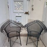 Pair of vintage wrought iron armchairs