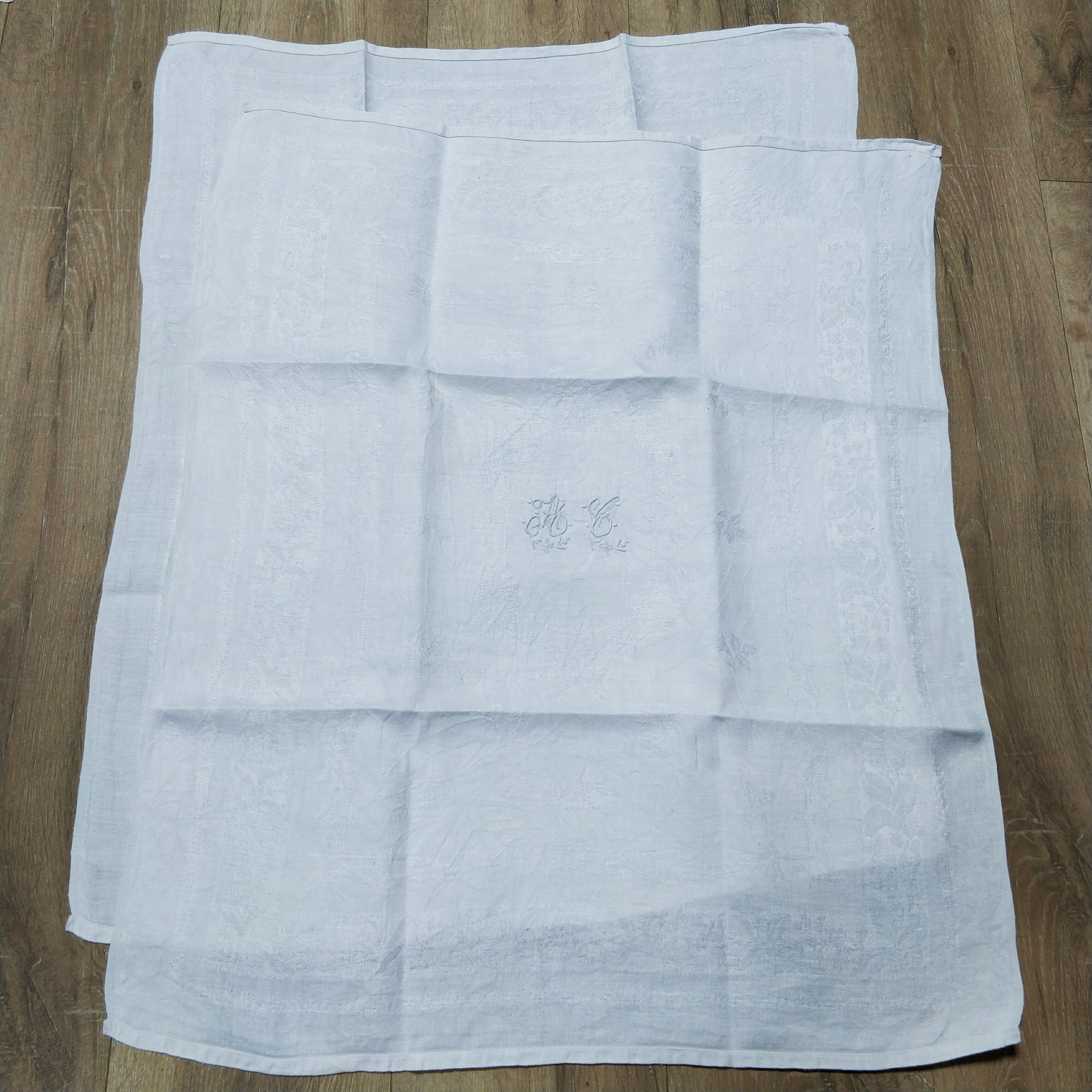 White linen towels embroidered