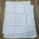White linen towels embroidered