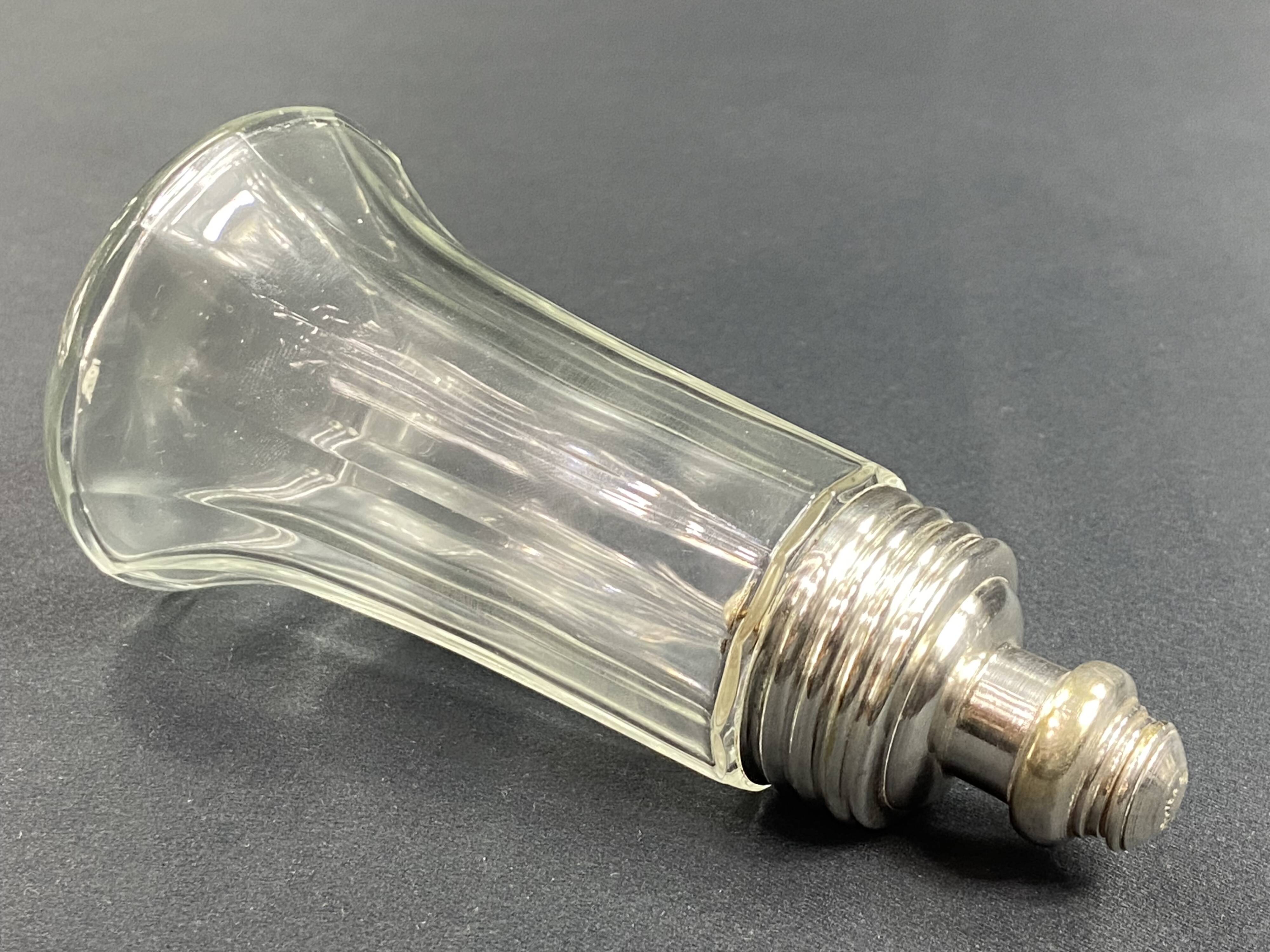Glass and silver metal sugar shaker