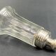 Glass and silver metal sugar shaker
