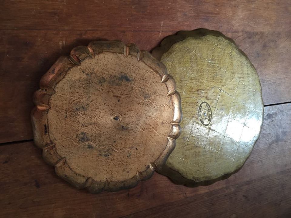 Two Florentine round table tops.