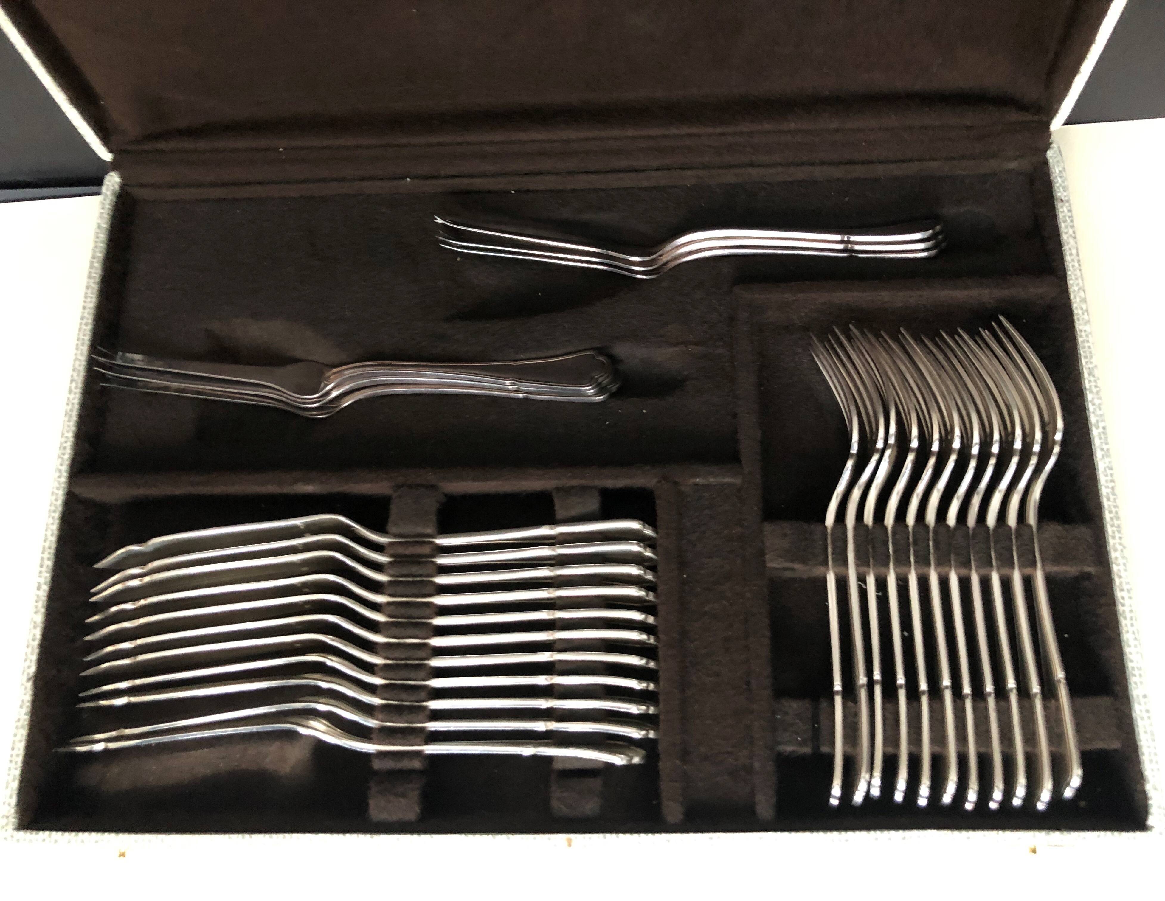 Housewife Ercuis in silver metal model with trilobed net 66 pieces