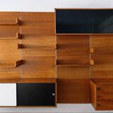 Immense teak library wall