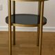 Brass side table and smoked glass