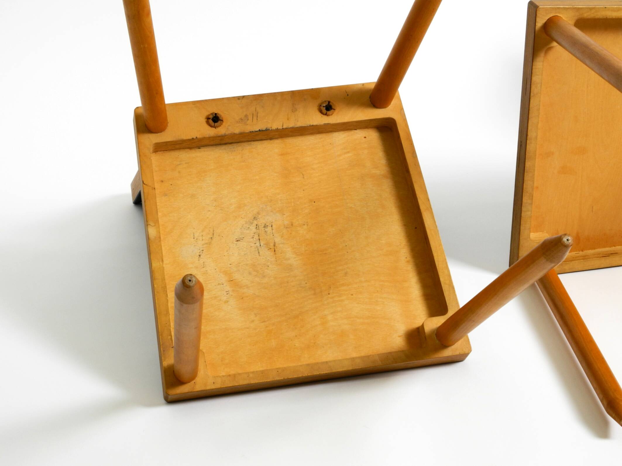 Two rare demountable plywood chairs by Axel Kufus model Stöcke for Atoll