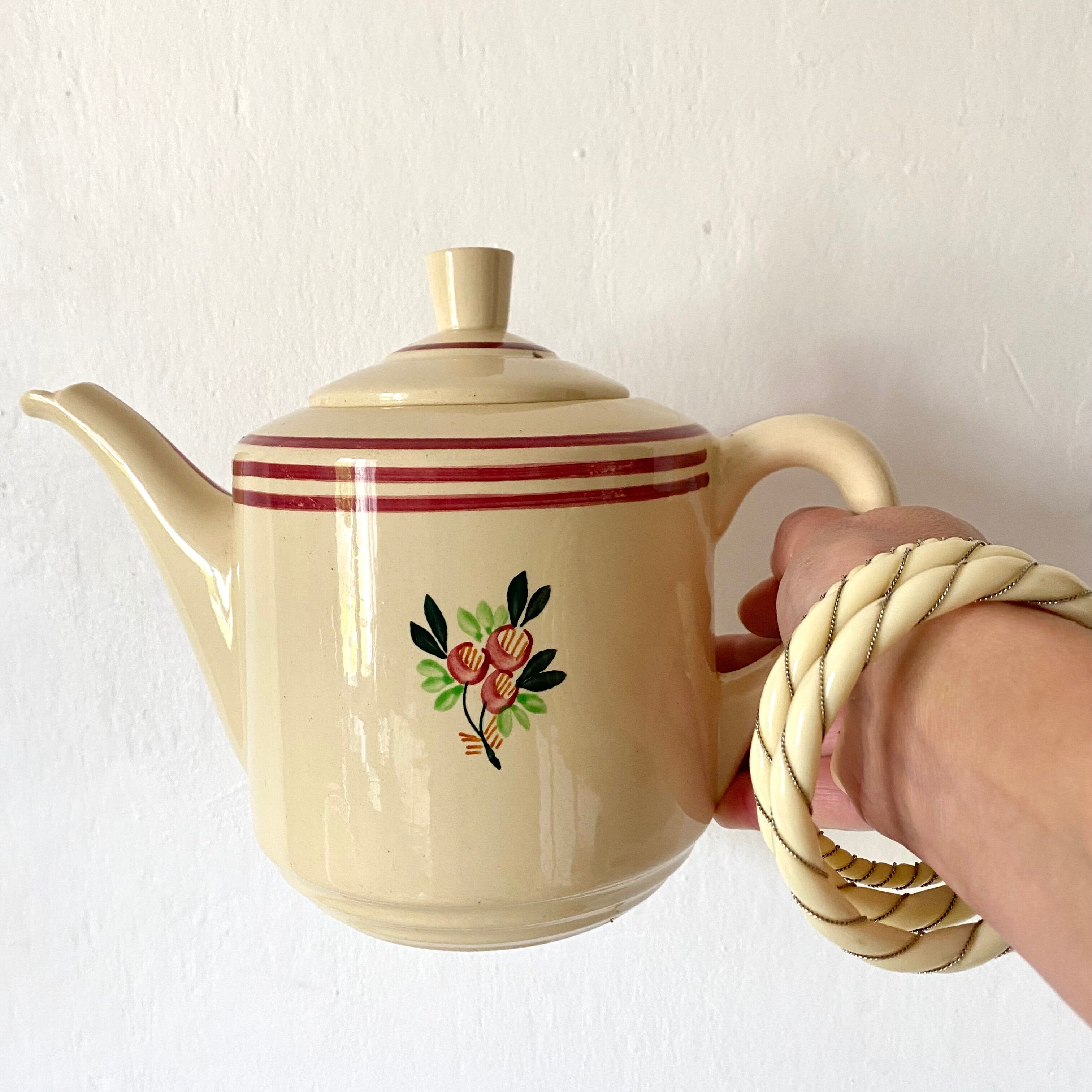 Old teapot in Gien earthenware