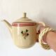 Old teapot in Gien earthenware