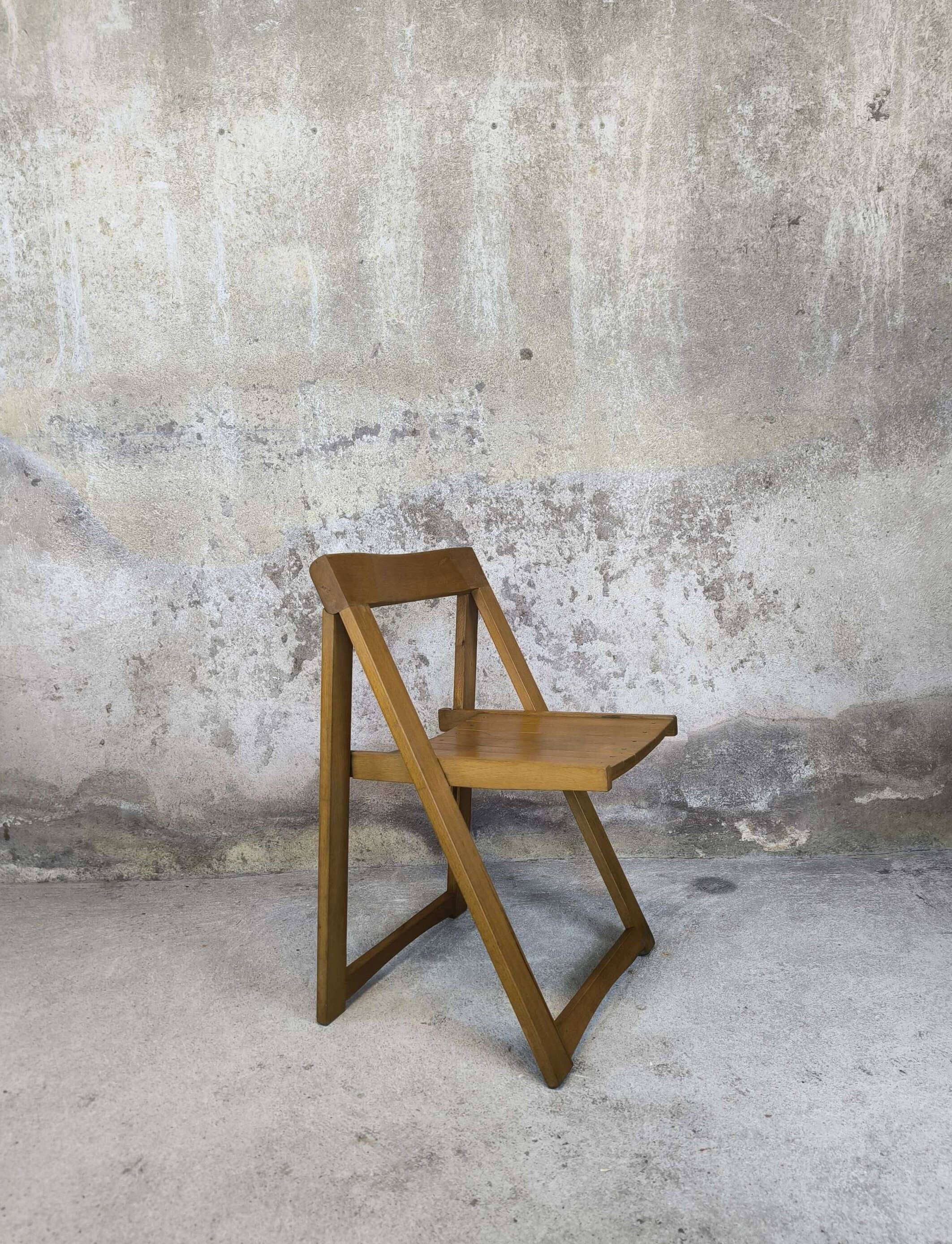 Vintage folding chair in wood by Aldo Jacober
