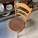 Baumann bistro chair in beech and orange and black geometric cotton