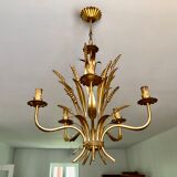 Golden suspension 5 fires with a bouquet of ears of wheat