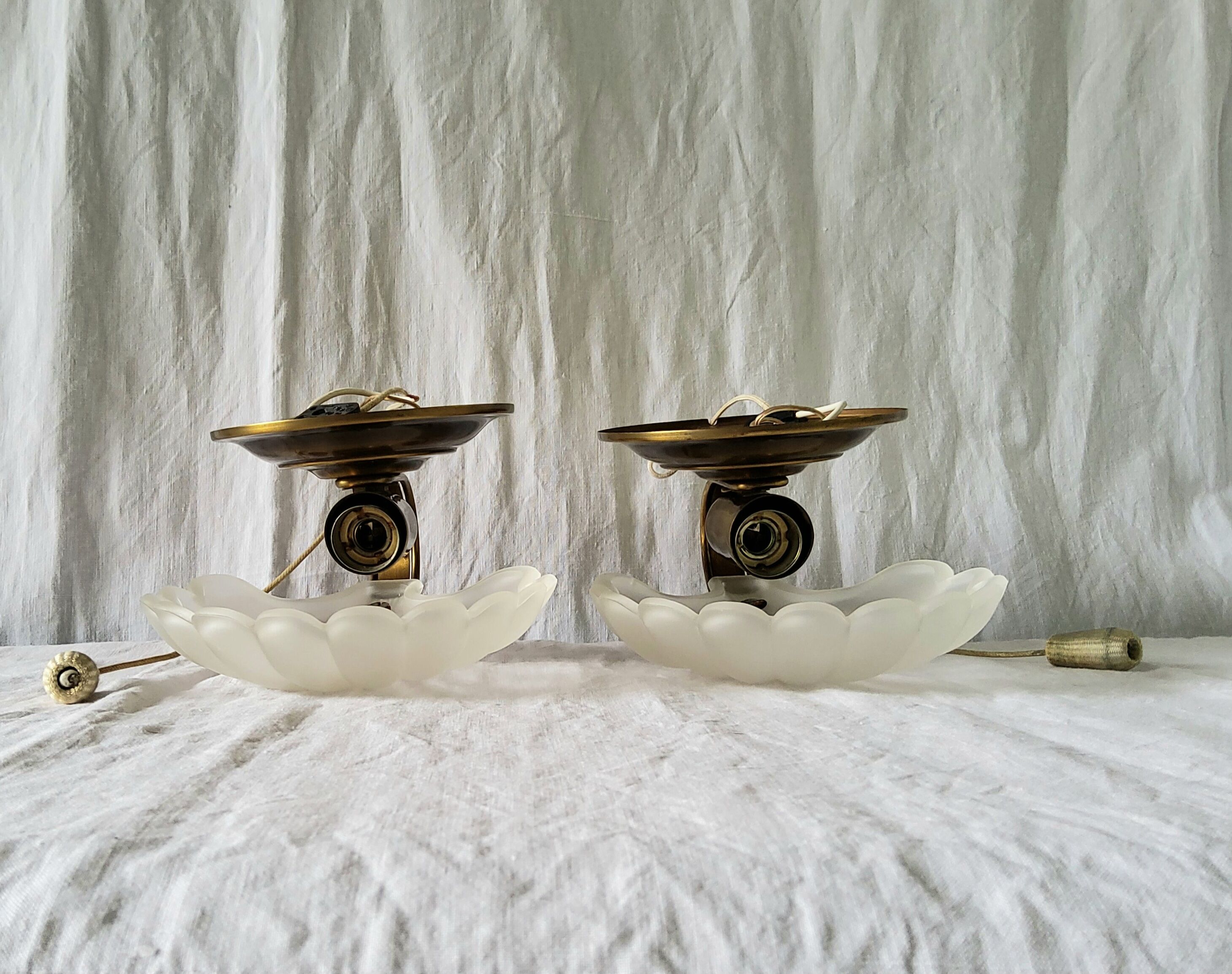 Pair of Deknudt shell sconces