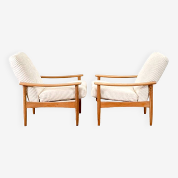 A pair of Lounge armchairs (Guy Rogers)