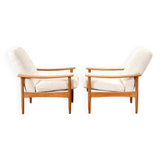 A pair of Lounge armchairs (Guy Rogers)