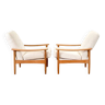 A pair of Lounge armchairs (Guy Rogers)