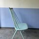 Chaise bâton blanche « Mademoiselle » du Finlandais Ilmari Tapiovaara