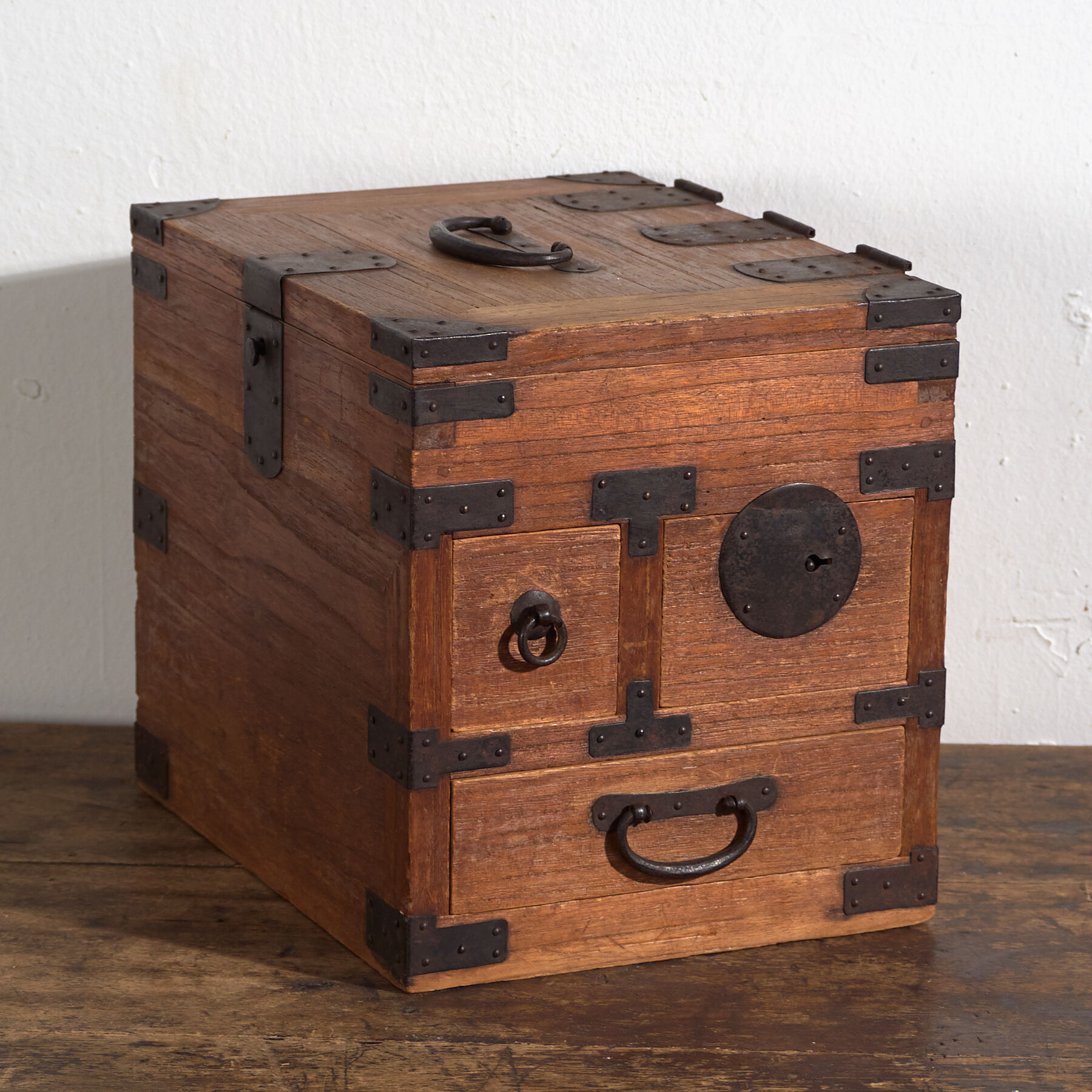 Japanese ko-dansu with hinged lid and paulownia wood drawers, Meiji–Taishō period, circa 1868–1926.
