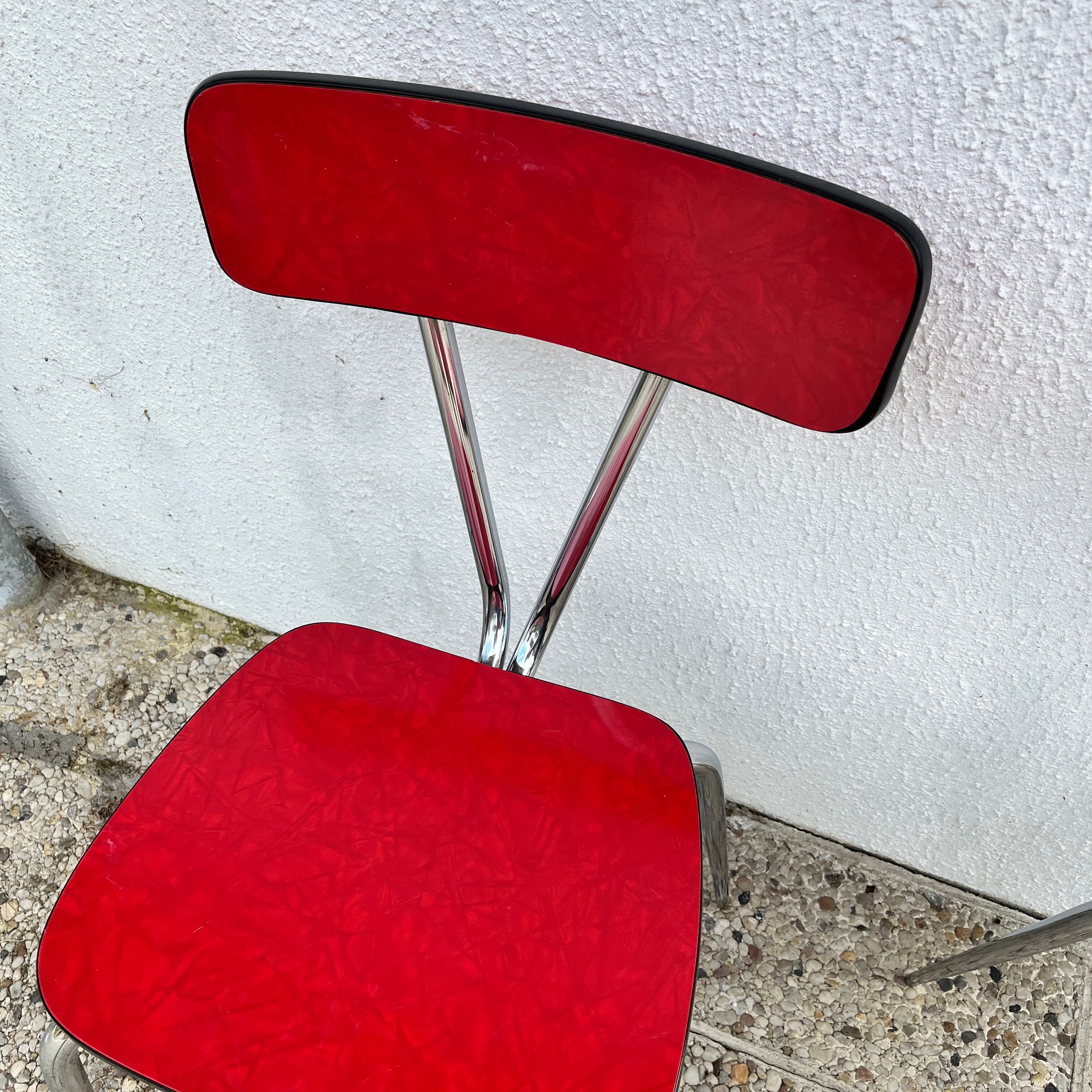 Chairs in formica red foot compass