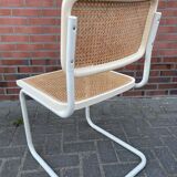 Cesca dining room chair designed by Marcel Breuer