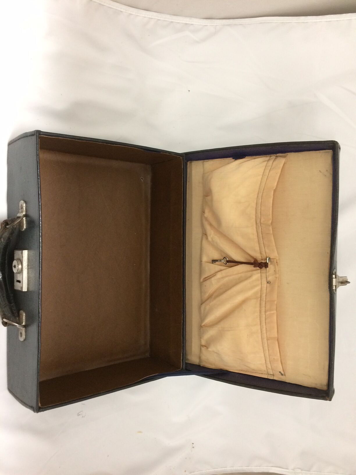 small vintage black suitcase