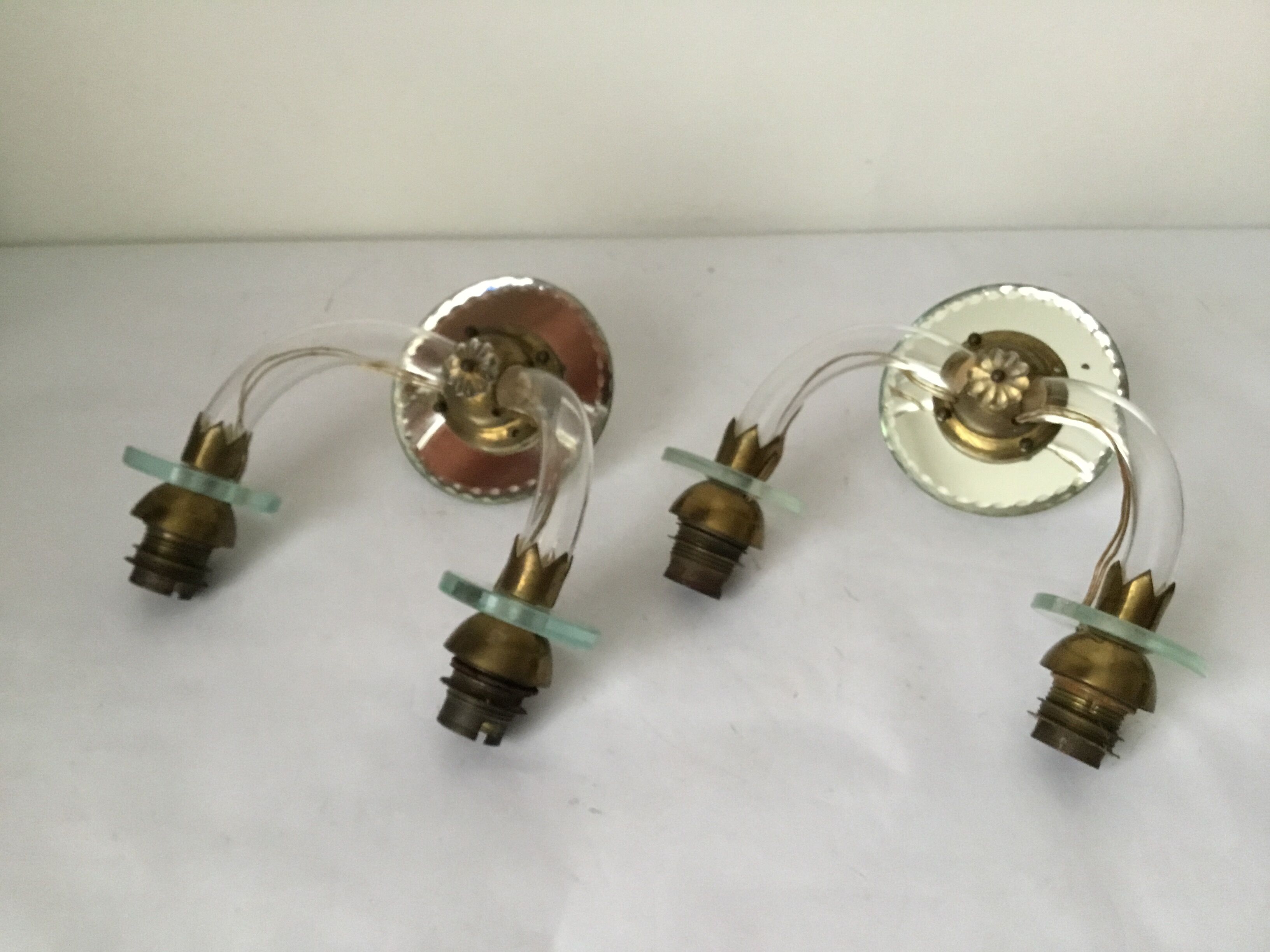 Pair of glass and mirror sconces