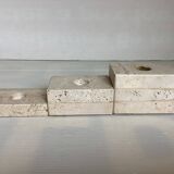 Trio of travertine candlesticks