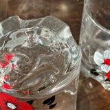 The service of 6 whiskey glasses with red flowers, with its bucket and its ice cube tongs.